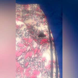 Adidas wide leg pants. Floral with the adidas sign on the front leg.